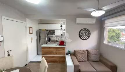 Apartamento com dois quartos, suíte e vaga