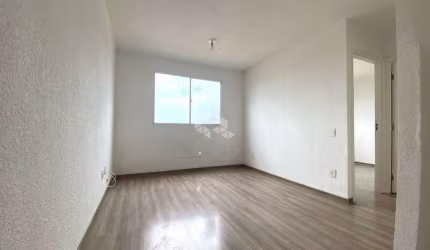 Apartamento com 2 dormitórios, sala, cozinha, 1 banheiro e 1 vaga de garagem rotativa