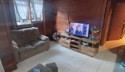 CASA COM 2 DORMITÓRIOS/ QUARTOS EM PALHOÇA SC, BAIRRO ALTO ARIRIÚ À VENDA POR R$ 400.000,00.