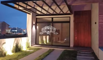 Casa nova em Capão da Canoa com 3 dormitórios (1 suíte) a 2 quadras do mar - Alto padrão e estilo contemporâneo