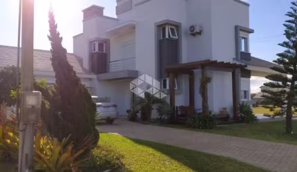 Casa á venda com 4 quartosdormitórios 3 vagasbox no condomínio Lagoa do Passo, OsorioRS