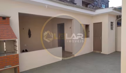 Casa térrea com edícula na ponta da praia em Santos