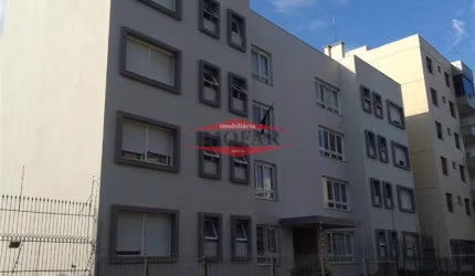 Apartamento com 02 dormitórios (sendo 01 suíte), sala para 02 ambientes, cozinha, área de serviço, banheiro social e garagem para 02 carros.  Água quente, gás encanado e piso parquet.  Prédio com hall