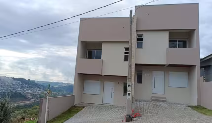 Excelentes sobrados Novos no Bairro Nossa Senhora das Graças!!  Com 03 dormitórios (sendo 01 suíte), sala para 02 ambientes, sacada, cozinha, churrasqueira, área de serviço, banheiro social e 02 vagas