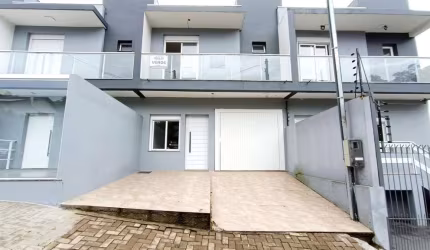 Excelente sobrado Novo no Bairro Nossa Senhora das Graças!!  Com 03 dormitórios (sendo 01 suíte), sala para 02 ambientes, sacada, cozinha, área de serviço, banheiro social e 02 vagas de garagem.  Com 