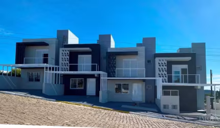 Excelente Sobrado de esquina com: 3 dormitórios, (1 suite), sala e cozinha em conceito aberto, banheiro, lavabo, área de serviço, duas sacadas, churrasqueira, esperas para água quente e split, estacio