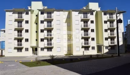 Apartamento com 2 dormitórios, sala e cozinha em conceito aberto, banheiro, área de serviço e estacionamento, MOBILIADO COM MÓVEIS NOVOS E SOB MEDIDA.