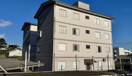 Apartamento à venda no bairro Imigrante, em Farroupilha/RS. Com 2 dormitórios, sala e cozinha em conceito aberto, banheiro social, área de serviço e vaga de estacionamento. Área privativa de 51,96m². 