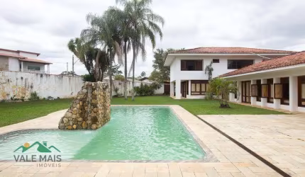Casa com 5 dormitórios à venda, 600 m² por R$ 2.100.000,00 - Clube dos 500 - Guaratinguetá/SP