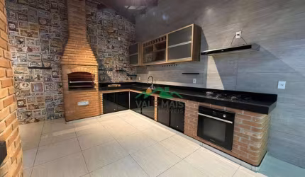 Casa com 3 dormitórios à venda, 175 m² por R$ 700.000 - Itaguacu - Aparecida/SP