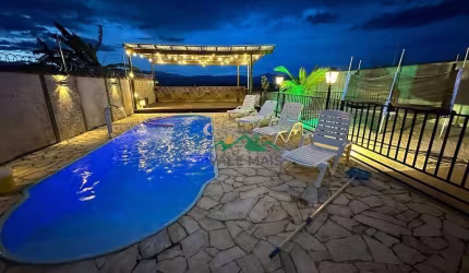 Casa com 3 dormitórios, 194 m² - venda por R$ 1.000.000,00 ou aluguel por R$ 4.000,00/mês - Residencial Village Santana - Guaratinguetá/SP