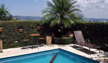 Casa em condomínio fechado com 4 quartos à venda na Alameda Miruna, 523, Alphaville, Santana de Parnaíba por R$ 2.600.000