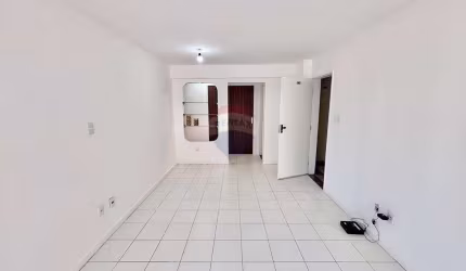 Apartamento na Pituba 3/4, 1 suíte, 3 banheiros, portaria 24h, garagem coberta e solta: Conforto e comodidade numa localização estratégica.