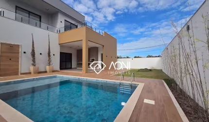 Casa com 4 dormitórios à venda, 439 m² por R$ 2.650.000,00 - Alphaville Jacuhy - Serra/ES