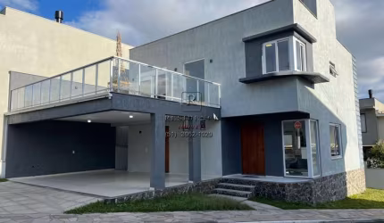 Casa em condomínio fechado com 3 quartos para alugar na Rua Ivo Walter Kern, 599, Hípica, Porto Alegre, 225 m2 por R$ 6.000