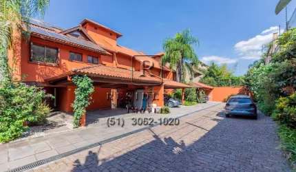 Casa em condomínio fechado com 4 quartos para alugar na Rua Ênio Andrade, 320, Três Figueiras, Porto Alegre, 650 m2 por R$ 35.000