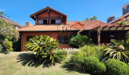 Luxuosa casa em condomínio para venda ou locação em Belém Novo, Porto Alegre-RS: 4 quartos, 4 suítes, 3 salas, 2 banheiros, 4 vagas de garagem, 350m².