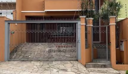 Casa com 3 quartos à venda na Rua Bélgica, 65, Marechal Rondon, Canoas, 300 m2 por R$ 1.300.000