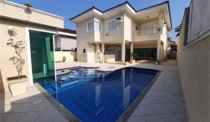 Casa com 5 quartos à venda em Jardim Acapulco - SP