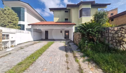 Sobrado com 4 quartos à venda em Jardim Acapulco - SP