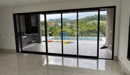 Casa de 4 quartos, sendo 4 suítes, com 306 m², 4 vagas, churrasqueira, piscina à venda em Colinas de Parnaíba I , na Imobiliária Buenos Jr Imóveis