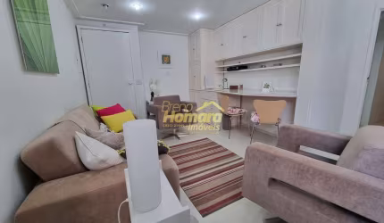 Conjunto Comercial Mobiliado com vaga  , em um excelente Prédio em Movimentada Avenida .