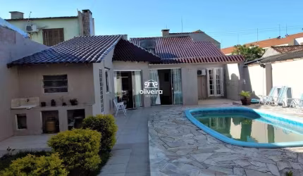 CASA COM PISCINA NO AREAL