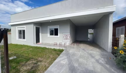 Casa com 3 dormitórios à venda, 137 m² por R$ 590.000,00 - Capão Novo - Capão da Canoa/RS