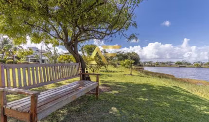 Lote em frente ao lago no Condomínio Melício Machado, Aruana (15x30 m²).