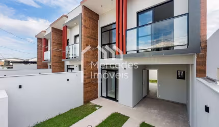 Sobrado com 1 suíte + 2 dormitórios à venda, 102 m² por R$ 870.000 - São João - Itajaí/SC
