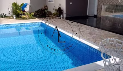 Exclusiva Casa de Luxo em Bolsão de Segurança com Piscina e 6 Suítes - 540m² de Sofisticação