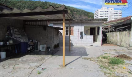 Terreno à venda, 270 m² por R$ 400.000,00 - Vila Voturuá - São Vicente/SP