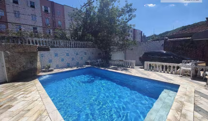 Casa com 3 dormitórios à venda, 223 m² por R$ 950.000,00 - Jardim Independência - São Vicente/SP