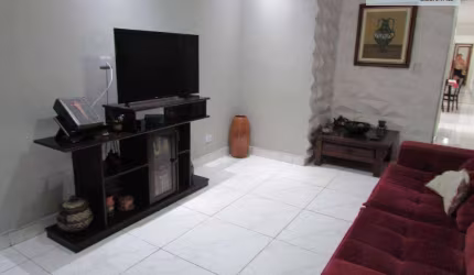 Casa com 3 dormitórios à venda, 119 m² por R$ 500.000,00 - Vila Voturuá - São Vicente/SP