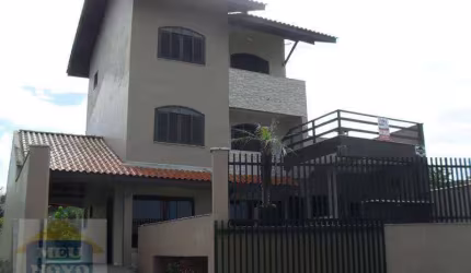 Sobrado com 4 dormitórios à venda, 229 m² por R$ 1.200.000,00 - Guaratuba - Guaratuba/PR