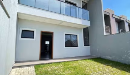 Sobrado com 3 dormitórios à venda, 129 m² por R$ 735.000,00 - Itacolomi - Balneário Piçarras/SC
