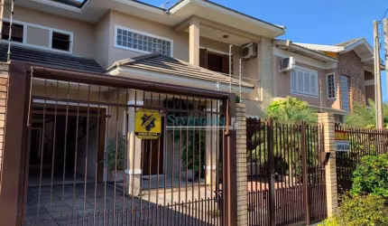 Sobrado com 3 dormitórios à venda, 201 m² por R$ 990.000,00 - Vale do Sol - Cachoeirinha/RS