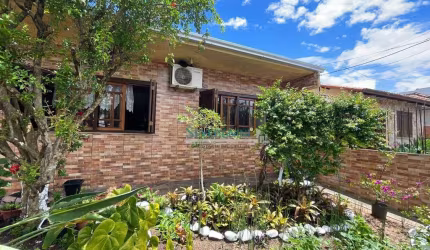 Casa com 4 dormitórios à venda, 241 m² por R$ 599.000,00 - Vila Márcia - Cachoeirinha/RS
