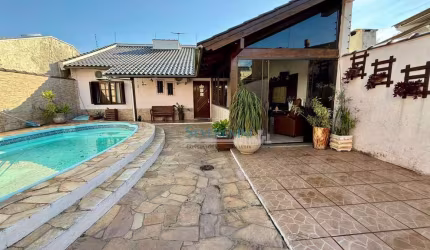 Casa com 3 dormitórios à venda, 81 m² por R$ 638.400,00 - Vila Imbui - Cachoeirinha/RS
