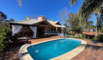 Sobrado com 3 dormitórios à venda, 389 m² por R$ 3.300.000,00 - Paragem dos Verdes Campos - Gravataí/RS