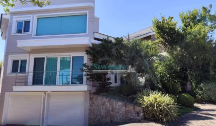 Sobrado com 4 dormitórios à venda, 350 m² por R$ 2.800.000,00 - Alphaville - Gravataí/RS