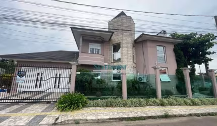 Sobrado com 4 dormitórios à venda, 229 m² por R$ 899.900 - Vera Cruz - Gravataí/RS
