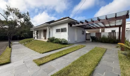 BELÍSSIMA CASA PLANA EM CONDOMÍNIO FECHADO