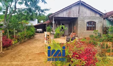 Terreno com 2 casas a venda em Guaratuba