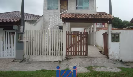 Terreno com 2 sobrados no Riviera em Matinhos