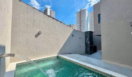 Sobrado com 3 dormitórios à venda, 160 m² por R$ 935.000 - Aviação - Praia Grande/SP