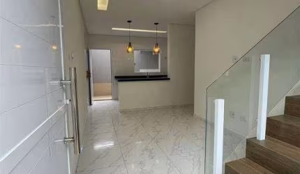 Casa de condomínio 2 dormitórios à venda, 55 m² por R$ 318.000 - Ocian - Praia Grande/SP