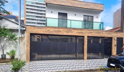 Casa 2 dormitórios com sacada frente rua, condomínio, 66,40 m² - Aviação em Praia Grande/SP