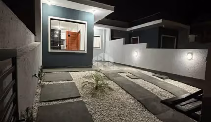 CASA GEMINADA SENDO 2 DORMITÓRIOS E 1 SUÍTE NO BAIRRO NOVA PALHOÇA Á VENDA POR R$ 350.000,00.