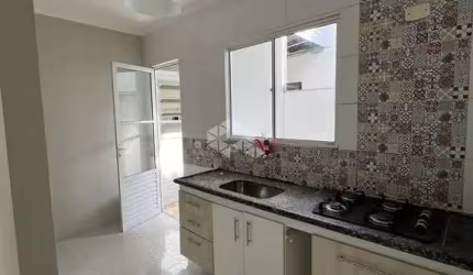 CASA EM CONDOMÍNIO COM 2 DORMITÓRIOS/ QUARTOS EM PALHOÇA SC, BAIRRO BELA VISTA À VENDA POR R$ 450.000,00.